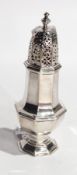 Edwardian silver sugar caster of octagonal faceted form, on a raised foot, Chester 1904, 4oz approx.