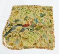 18th century woolwork fabric piece, possibly from a corner chair, depicting parrot on a branch,