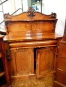 A Victorian rosewood chiffonier with a shelf back,