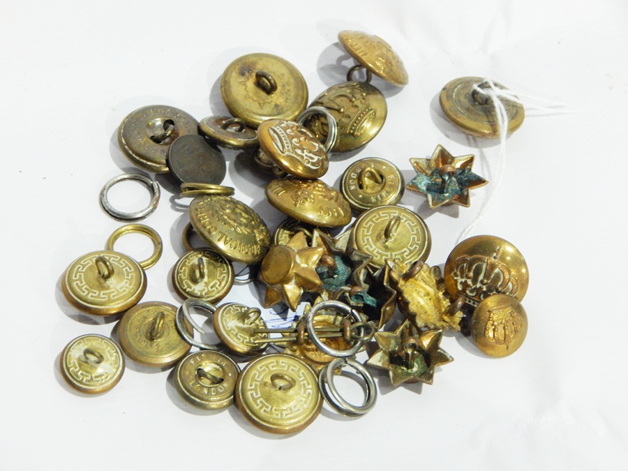 Quantity of 1920's "Puzzle Drive Anchor Stone" puzzles, quantity of military brass buttons, stopper,