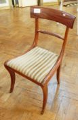 A set of six Regency mahogany dining chairs with bar backs, rope twist crossrail,