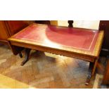 Reproduction mahogany dropflap coffee table, with insert leather top,