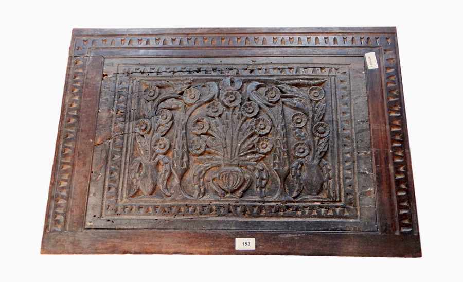 17th century carved walnut panel, floral design with pine trees and chip-carved surround, framed,