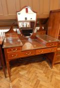 An Edwardian Sheraton style mahogany and satinwood inlaid shield back mirror dressing table,