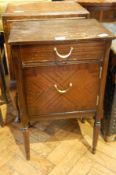 A walnut veneer side cupboard with frieze drawer and hinged cupboard below on cabriole legs,