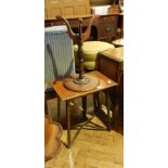 A mahogany circular top wine table with tripod support and a mahogany rectangular top side table on