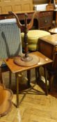 A mahogany circular top wine table with tripod support and a mahogany rectangular top side table on