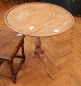 A dish top occasional table on cabriole legs and a side table on spirally twisted legs with block