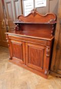 A Victorian mahogany chiffoniere with open shelf back with scrollwork supports,