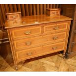 Edwardian mahogany and satinwood inlaid chest, the top with a pair of trinket drawers,
