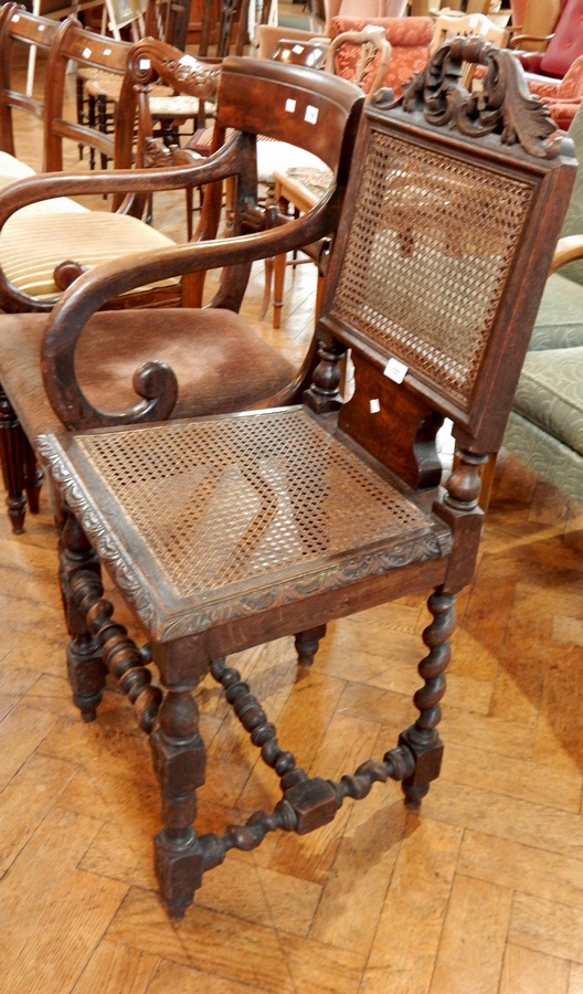 An oak chair with cane seat and back,