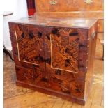 Oriental inlaid cabinet of various woods,