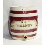 Large ceramic oval spirit barrel, "Brandy" with pink lustre and gold banding, lacking tap,