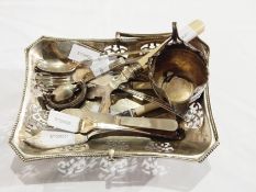 A quantity of silver plate to include entree dishes, mugs, cocktail shaker, trays, etc.