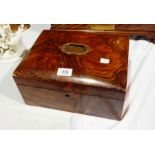 A finely grained walnut sewing box with metal handle, satin quilted lid,