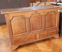 18th century oak mule chest with moulded edge rising top, carved fielded panel front,