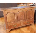 18th century oak mule chest with moulded edge rising top, carved fielded panel front,