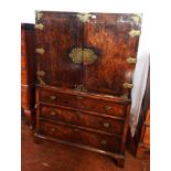 A Georgian style figured walnut lacquer chest on chest with four long and seven short drawers