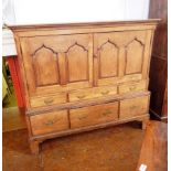 18th century oak food cupboard, with shaped fielded panel doors enclosing shelf,