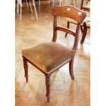 A set of six William IV mahogany dining chairs, with foliate carved bar backs,