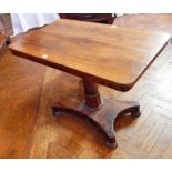 A Victorian rosewood rectangular top side table on faceted tapering column to platform base and
