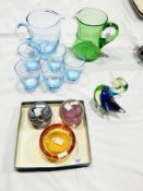 Blue and green duck glass paperweight, Caithness bubble glass paperweight and another,