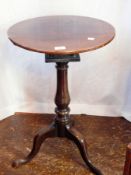 18th century mahogany circular-top tripod table with birdcage, on turned baluster column,