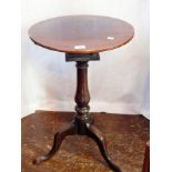 18th century mahogany circular-top tripod table with birdcage, on turned baluster column,