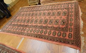 Persian style rug with red field, geometric pattern,