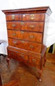 18th century walnut chest on stand, with two short and three long graduated drawers in top section,