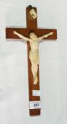 Plaster model of the crucifix on wooden cross