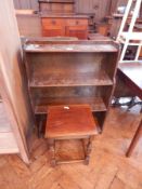 An oak open bookcase of four shelves, an oak square top side table,