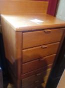 A pair of modern bedside chests of three short drawers,