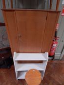 An oak veneered wardrobe with three shelves, white painted open bookcase,