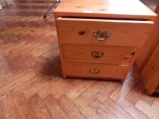 A pine chest of four drawers together with two pine side cabinets (3)