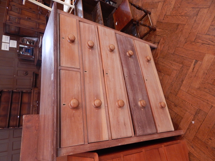 A pine chest of two short and three long graduated drawers, width 106 cm,