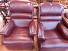 Maroon leatherette reclining armchairs