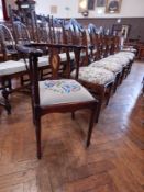 A marquetry inlaid corner chair with upholstered floral decorated seat cover