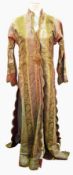 An early 20th century brocade full-length kaftan-style dressing gown,