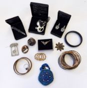 A large quantity of costume jewellery including St Justin pewter jewellery (2 boxes)
