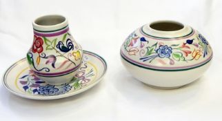 Two Poole pottery bowls, cockerel and floral decorated,