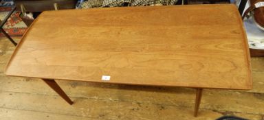 20th century teak coffee table on tapering supports, united by two stretchers,