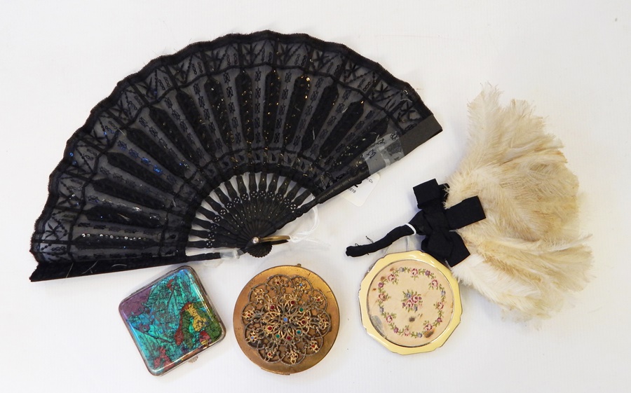 Three compacts, a small swansdown fan (put together as a posy), a black net and sequinned fan,