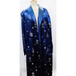 A Chinese style dark blue satin full-length dressing gown with tie belt