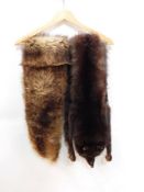 A fox fur scarf with head, a fox collar, various other fur pieces,