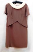 A brown crepe short-sleeved dress by Berliner, the cowl neck trimmed with white mink,