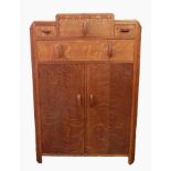 Art Deco cabinet with three short and one long drawers and cupboard, reeded borders,
