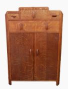 Art Deco cabinet with three short and one long drawers and cupboard, reeded borders,