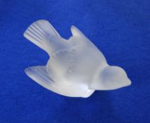 Lalique-style satin glass bird perched with open wings,