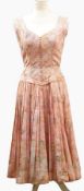 A 1960's Parisian silk tea-dress, pink, printed with floral scenes, drop waist,